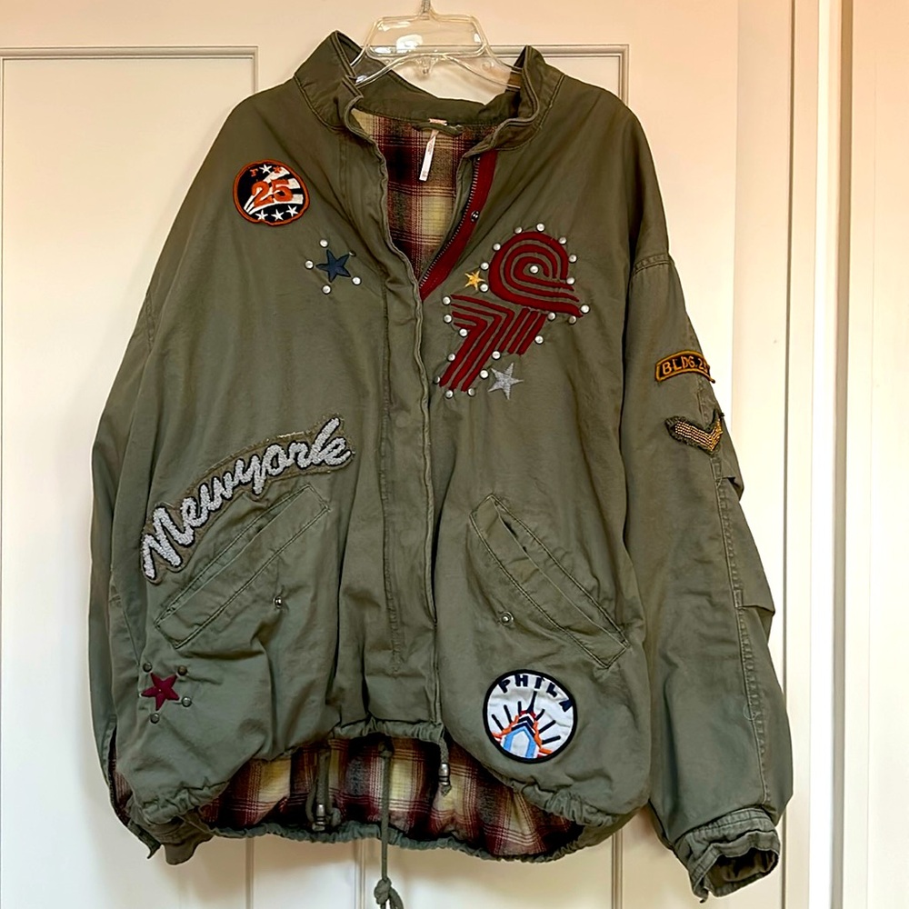 Free People Army patched bomber jacket.